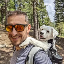 Dr. Igolnikov hiking with his dog